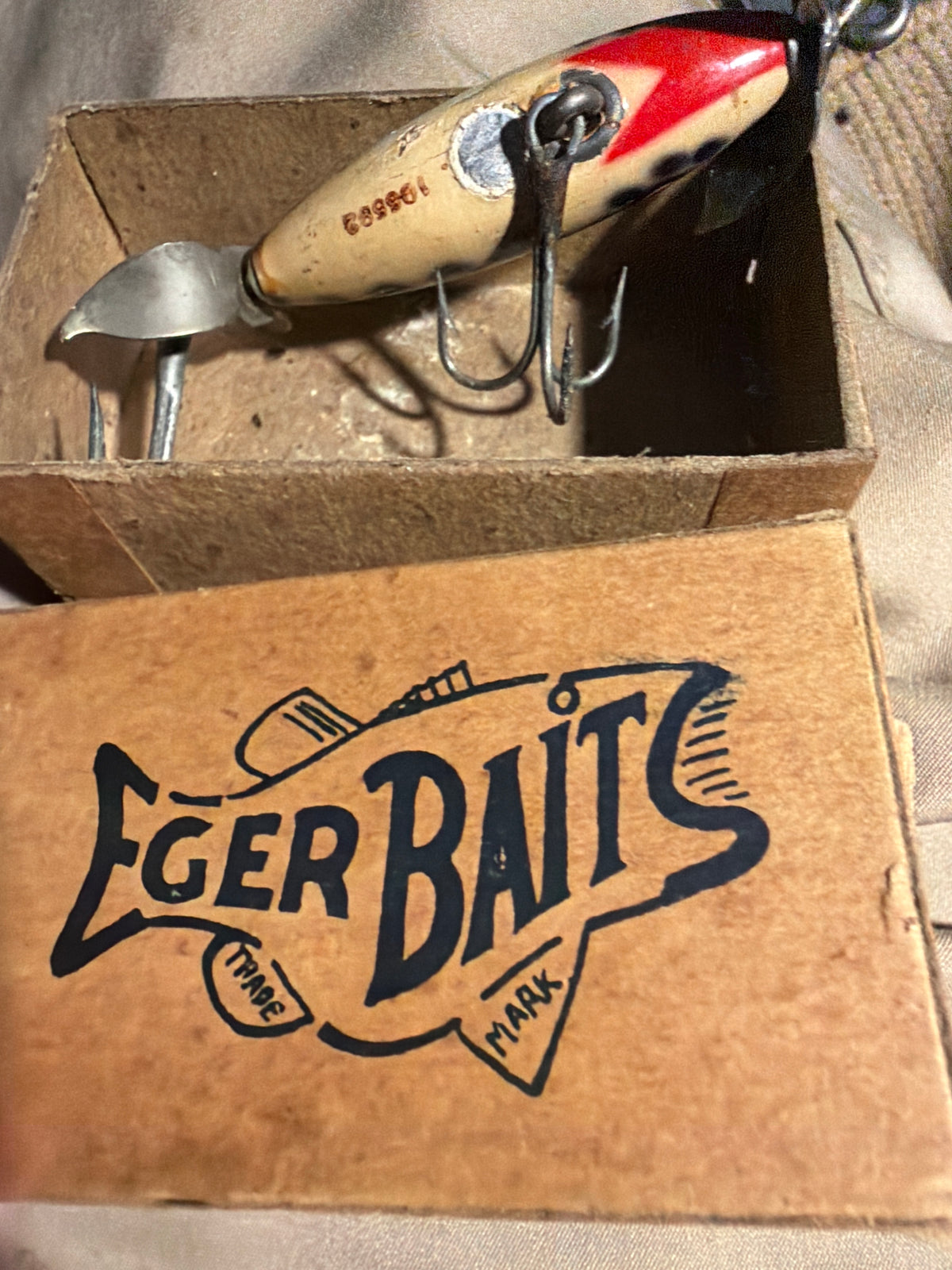 Vintage Eger Baits fishing lure with original cardboard box